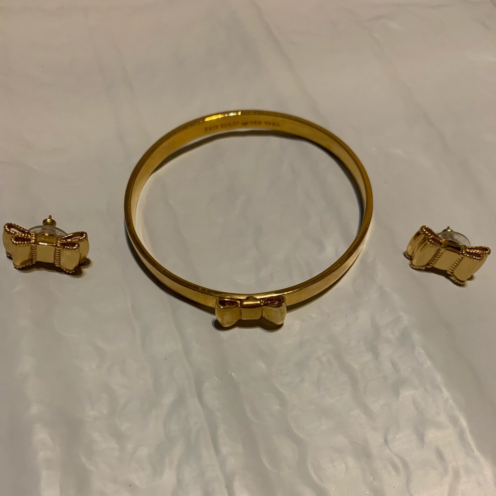 Gold Kate Spade bracelet and earrings set